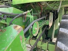 items/61fffb664d1bed11b5cf0003fff934d4/1984johndeere7720combine-8_df0e77d1b6e24d17a236ca2441ebf7f3.jpg