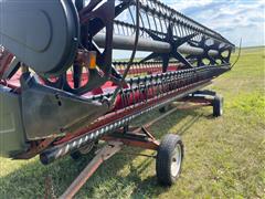 items/6554c967239e4bfc89cff9afec2e5dd8/caseih1020combineheaderwtrailer_14795044ad434945bf457f43c180f475.jpg