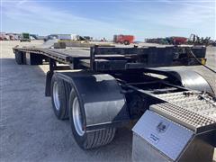 items/67bb89b1acd4ee11a73c0022488eb5d1/53flatbedsemitrailer_cd7230c9817c455b9d82023bea9cd1b9.jpg