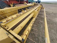 items/6845e497a8a0eb1189ee00155d424509/newholland2550self-propelledwindrowerwhaybine2216head_7a435ffe42ea4b8ea2428e59c52e83ac.jpg