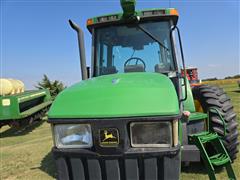 items/6a1fc165c661ef11a4e60022488ec0a9/2000johndeere77102wdtractor_c9b6ec7776bf4842bfc004ec66df895a.jpg