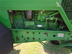 items/6a1fc165c661ef11a4e60022488ec0a9/2000johndeere77102wdtractor_f49952b888e547058374f5ba5ae5566b.jpg