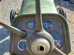 items/6a40a57beb114caca3721773d61661c0/1960johndeere430-w2wdtractor-2_238510d8f7554532875fc94ac77853ce.jpg