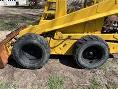 items/6befa5f1f6d9ed11a81c6045bd4bc5ad/newhollandl35skidsteer-4_29d1af2975584eb99860462704818a99.jpg