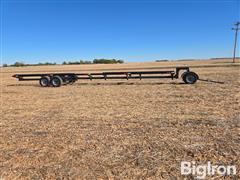 items/6df0bbc95c94ef1195f6000d3a620d5e/harvestagah-6386wheelheadertrailer_b31f9566a70147e6b19c7d65030823ea.jpg