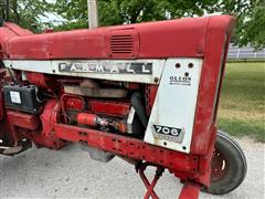 items/6eafda13751bee11a81c000d3ad3f876/1967farmall706dieselwidefront2wdtractor_c882f45872be4e6ca77e1e719d024a98.jpg