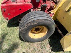 items/70359bd91e37ee11a81c000d3a61103f/1981newhollan892pulltypeforageharvester_68bca1adf5db47c98ea14fbdf65e6bae.jpg