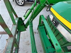 items/722c1b7e47cced11a81c6045bd4cc723/johndeere1070mwfdutilitytractorwloader_1e53c582d9514a17a99b70040059e29c.jpg