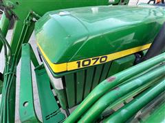 items/722c1b7e47cced11a81c6045bd4cc723/johndeere1070mwfdutilitytractorwloader_2db961e8520b41a6a28e4ee3426a4645.jpg