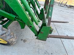 items/722c1b7e47cced11a81c6045bd4cc723/johndeere1070mwfdutilitytractorwloader_4269812f6a8942caaf86e18ae5d0cf0c.jpg