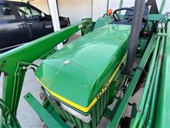 items/722c1b7e47cced11a81c6045bd4cc723/johndeere1070mwfdutilitytractorwloader_4a2fb7ef3e0d41ad96fe4948cbf0f8e6.jpg