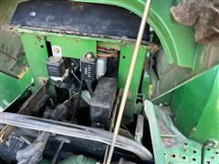 items/722c1b7e47cced11a81c6045bd4cc723/johndeere1070mwfdutilitytractorwloader_4b863b4e9f884e0f9d2db194cef71c6a.jpg