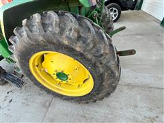 items/722c1b7e47cced11a81c6045bd4cc723/johndeere1070mwfdutilitytractorwloader_61504288e03e4f90ae5e268769010532.jpg