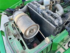 items/722c1b7e47cced11a81c6045bd4cc723/johndeere1070mwfdutilitytractorwloader_d288d0ac6619445f94a89137310a0bed.jpg