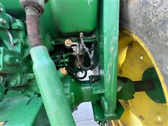 items/722c1b7e47cced11a81c6045bd4cc723/johndeere1070mwfdutilitytractorwloader_d2cbf22197d7466bbc048eea38422f7e.jpg