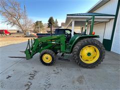 items/722c1b7e47cced11a81c6045bd4cc723/johndeere1070mwfdutilitytractorwloader_ff352d0a1a0447cea4f6d0abbd858811.jpg