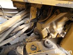 items/74137d1e88814d82a663cc82ed11d25e/caterpillar938fwheelloader-2_62faf6860b8e424e9919458acb6d6487.jpg