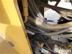 items/74137d1e88814d82a663cc82ed11d25e/caterpillar938fwheelloader-2_b6933760469442b78fe4399e0cc01e4d.jpg