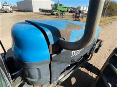 items/7444f0620780ee11a81c6045bd4a636e/newhollandversatiletv140bi-directionaltractor_8ed161e03ed84967bf38318632200b5e.jpg