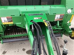 items/780b076c1cc8ed11a81c6045bd4b1cce/2018johndeere560mroundbaler-9_fa3a0378773b48b99cbf04392e709f4b.jpg