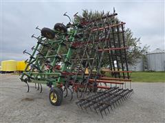 items/7852e10b595bef11a4e6000d3a62e002/johndeere9803sectionfieldcultivator_2c73f440bbbf459e9026933d2177279b.jpg