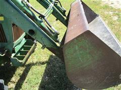 items/7cb198f8973fee11a81c000d3a61c84b/1988johndeere1050mfwdtractor-3_1054a3f7b57847f1aed0e5da7c091731.jpg