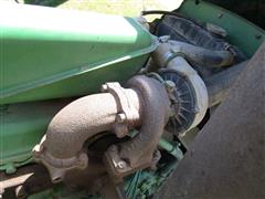 items/7cb198f8973fee11a81c000d3a61c84b/1988johndeere1050mfwdtractor-3_11b7b90de0204c64a1b3e536cc19bfda.jpg