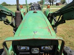 items/7cb198f8973fee11a81c000d3a61c84b/1988johndeere1050mfwdtractor-3_1e92ca2f6b034de0b30de22bfa0f286a.jpg