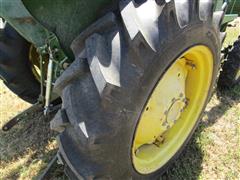 items/7cb198f8973fee11a81c000d3a61c84b/1988johndeere1050mfwdtractor-3_425803431b1f455ba0335576ab62d0f1.jpg