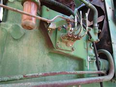 items/7cb198f8973fee11a81c000d3a61c84b/1988johndeere1050mfwdtractor-3_484b16b5bedf4851951d80cf5cddfe00.jpg