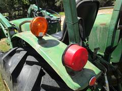 items/7cb198f8973fee11a81c000d3a61c84b/1988johndeere1050mfwdtractor-3_9228bb7ba305441595e5f499be67f578.jpg