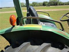 items/7cb198f8973fee11a81c000d3a61c84b/1988johndeere1050mfwdtractor-3_95ef27e3329f409dba3962315f18c467.jpg