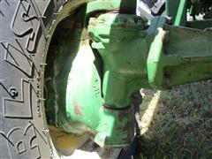 items/7cb198f8973fee11a81c000d3a61c84b/1988johndeere1050mfwdtractor-3_a1830cf2cf644124b501549dc5b83dbf.jpg