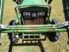 items/7cb198f8973fee11a81c000d3a61c84b/1988johndeere1050mfwdtractor-3_b9f1381217e342418f544992a5fb7b26.jpg