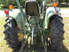 items/7cb198f8973fee11a81c000d3a61c84b/1988johndeere1050mfwdtractor-3_c2609f8dc1024fee9ddd87c197660042.jpg