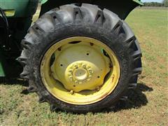 items/7cb198f8973fee11a81c000d3a61c84b/1988johndeere1050mfwdtractor-3_ebef55a275a143c893e1cfd35e58ec97.jpg