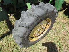 items/7cb198f8973fee11a81c000d3a61c84b/1988johndeere1050mfwdtractorand75loader_15221af6d24441deb3e179a28fad9f8f.jpg