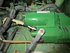 items/7cb198f8973fee11a81c000d3a61c84b/1988johndeere1050mfwdtractorand75loader_a206ef166ab8488fbb1095ab2ce28238.jpg