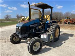 New Holland TS100 2WD Tractor W/Alamo 50 Boom Axe Mower 