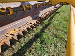 items/7d7127fe755dee11a81c6045bd4a636e/newholland1112windrower_33f793db9b14410c9398d5af590ae60c.jpg