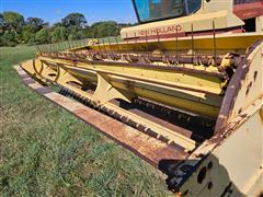 items/7d7127fe755dee11a81c6045bd4a636e/newholland1112windrower_a565e138e79945719df6f85f54e4bc7c.jpg