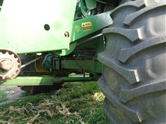 items/7e9a4c735e3eef11b4ad000d3acfdee0/1978johndeere4400combine-3_13ce609bf9344d618f87e8dec9e654a2.jpg