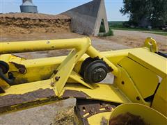 items/825549607c43ef11b4ad0022488ff517/johndeere770rotaryforageheader_ce9c91394f6b4106a72b202493e01586.jpg