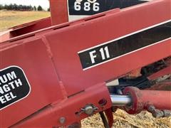 items/83a7cb74a160ed11a76e0003fff934d4/caseih6862wdtractorwfarmhandf11loader_05fd1f34cbe44a22a25371dce56254bf.jpg