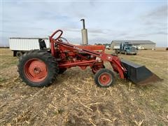 items/83a7cb74a160ed11a76e0003fff934d4/caseih6862wdtractorwfarmhandf11loader_2ddb6daa61b646dcb9997da9ca76da0e.jpg