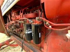 items/83a7cb74a160ed11a76e0003fff934d4/caseih6862wdtractorwfarmhandf11loader_2f5dfc355e2c4f00863179076e2ce0d7.jpg