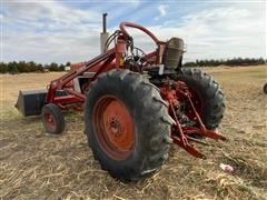 items/83a7cb74a160ed11a76e0003fff934d4/caseih6862wdtractorwfarmhandf11loader_5e22d0c8b5684a0391b9874b9e0b38cc.jpg