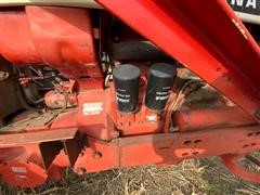 items/83a7cb74a160ed11a76e0003fff934d4/caseih6862wdtractorwfarmhandf11loader_9656a6ef061e4aba9471ec3b9473de36.jpg