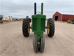 items/8496d98093abec11bea100155d423d41/1956johndeere702wdtractor-2_0a26eb6be4f045f89db457f9221a24b4.jpg