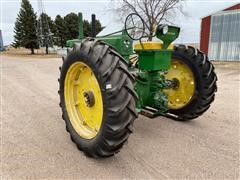 items/8496d98093abec11bea100155d423d41/1956johndeere702wdtractor-2_ba0c8ba0d31d40a89b99a59cb35fa812.jpg